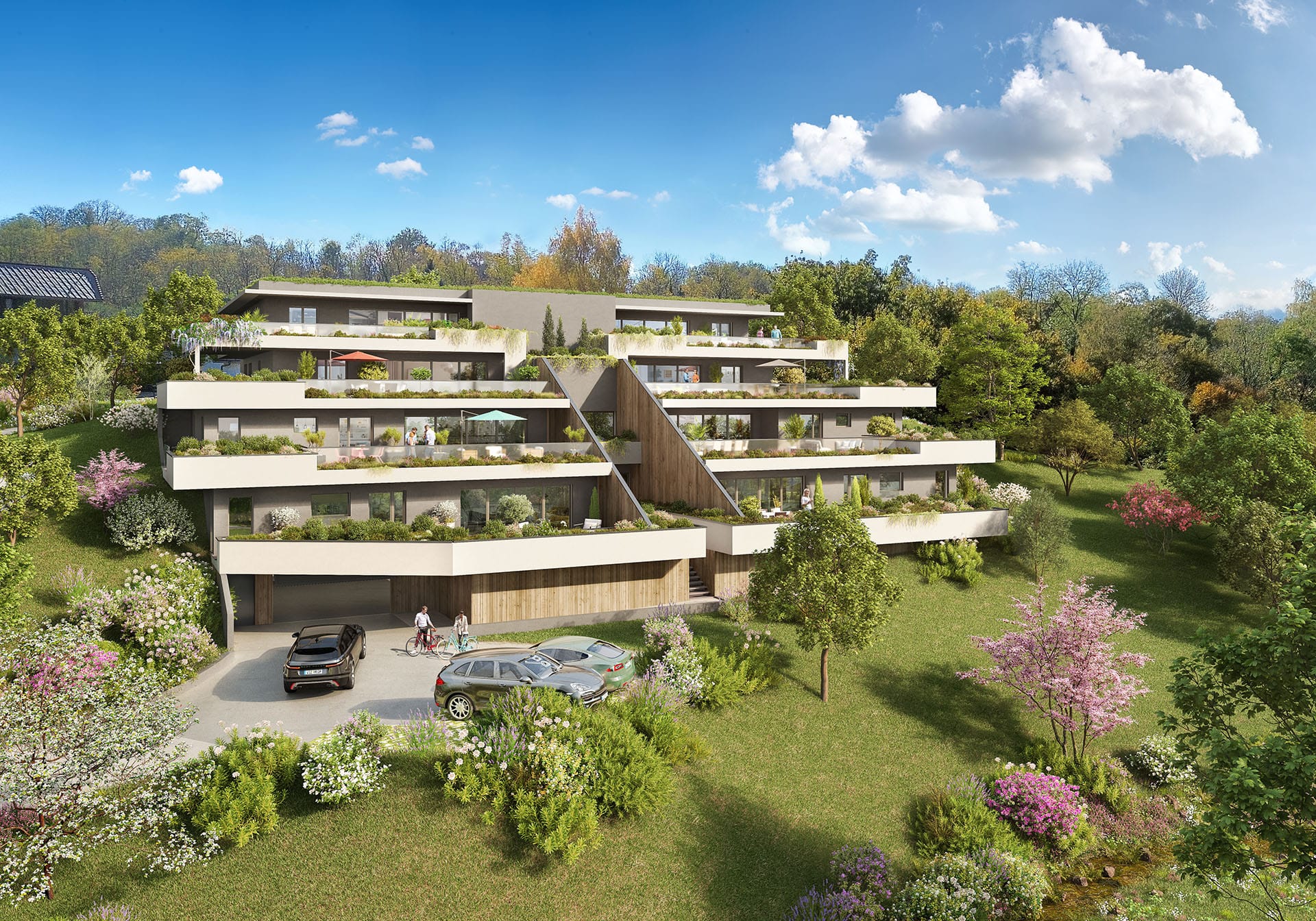 Immeuble moderne entouré de verdure.